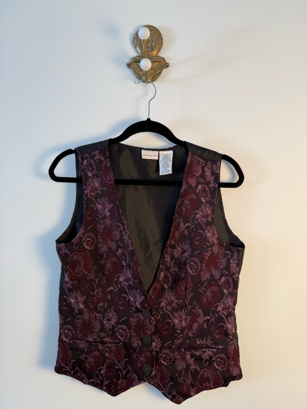 Vintage women’s brocade vest with floral pattern